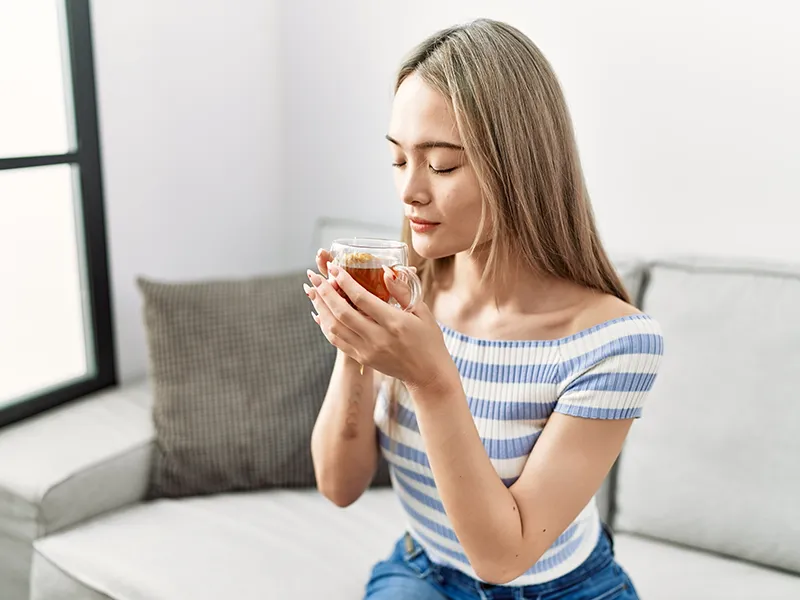 female drinking Chinese herbal 